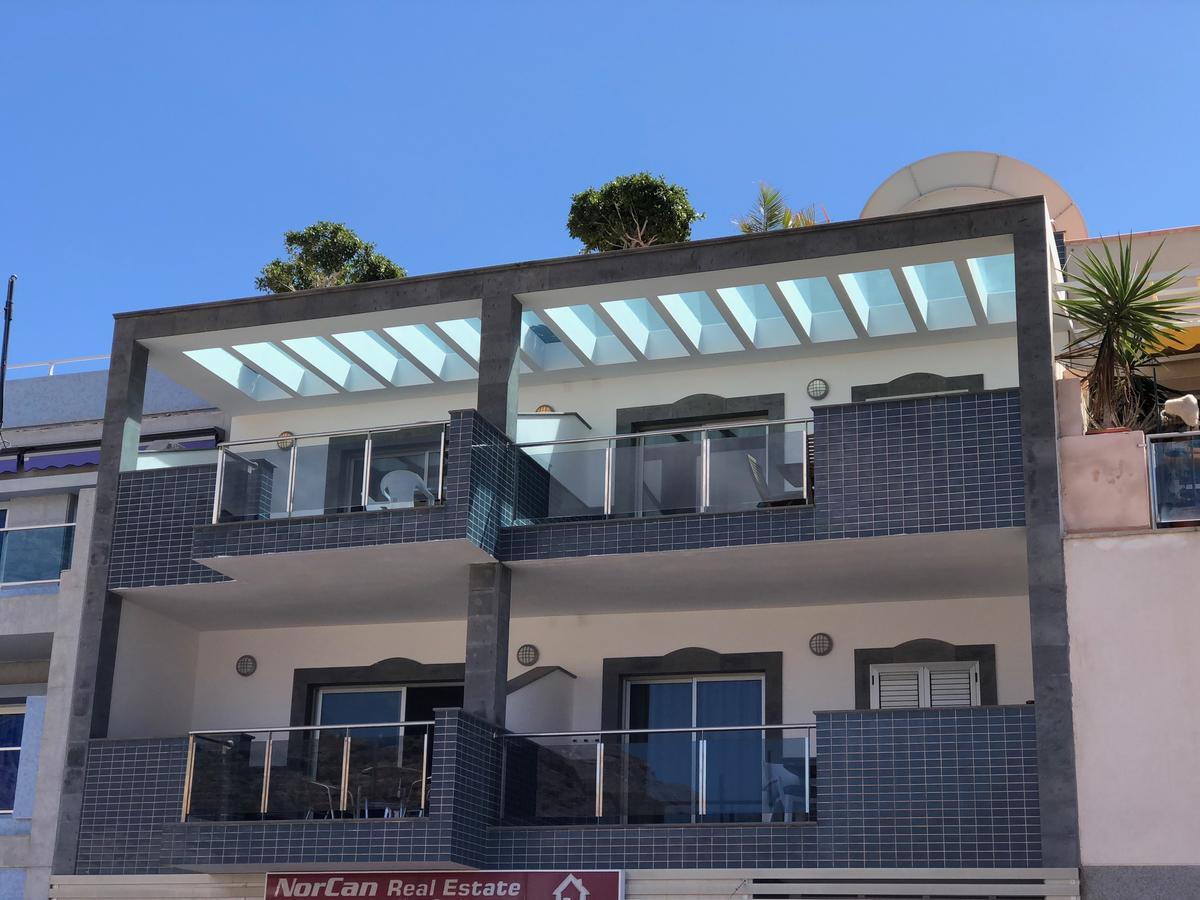 Billy'S Beachfront Apartment With Pool Access 푸에르토 데 모간 외부 사진